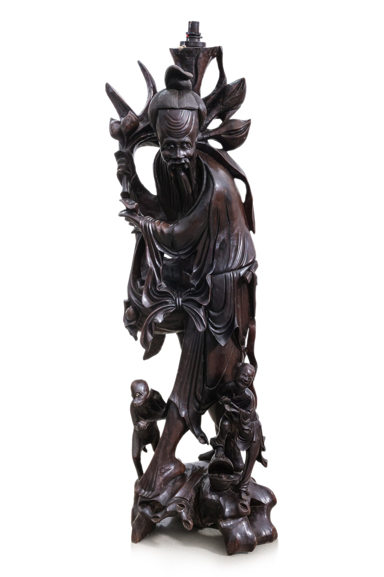 A VERY LARGE CHINESE CARVED HARDWOOD FIGURAL FLOOR LAMP