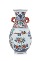 A MINIATURE WUCAI VASE AND A BLUE AND WHITE LOTUS DISH