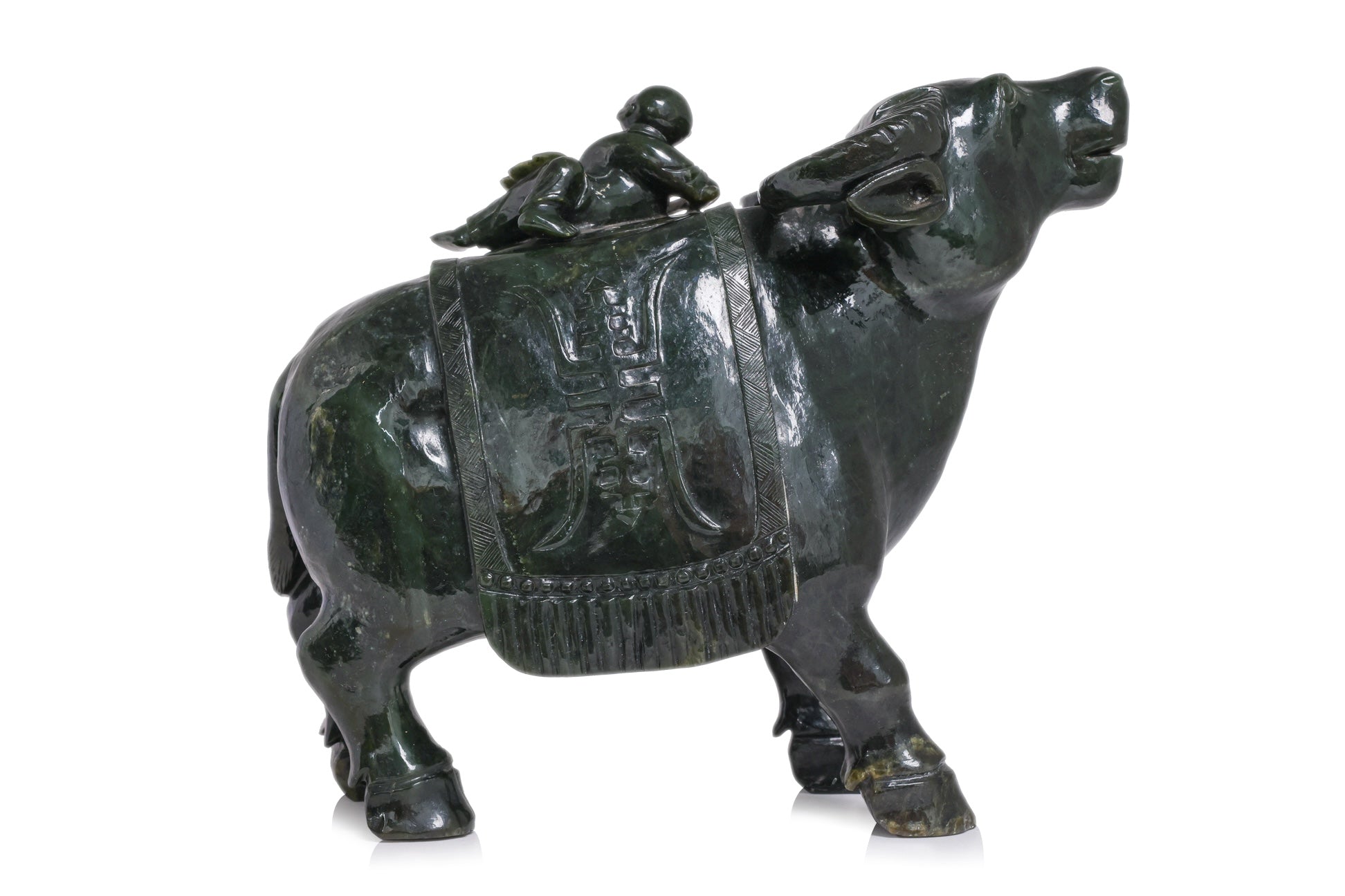 A LARGE SPINACH JADE BUFFALO AND BOY VESSEL
