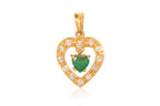 A HIGH KARAT GOLD EMERALD AND DIAMOND 'HEART' PENDANT