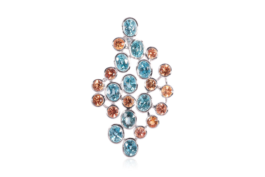 A BLUE ZIRCON AND ORANGE SAPPHIRE PENDANT