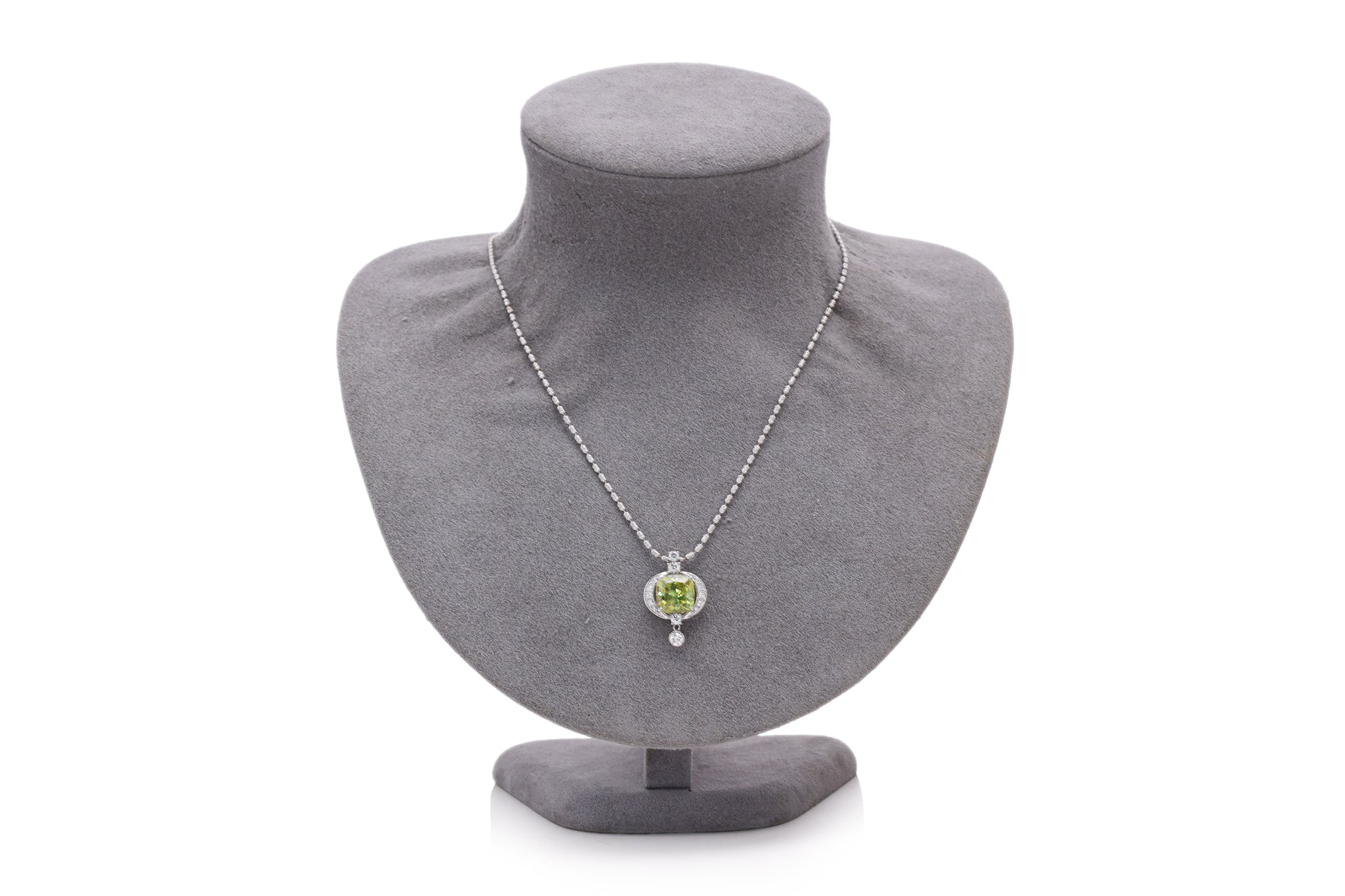 A SPHENE AND DIAMOND PENDANT ON CHAIN