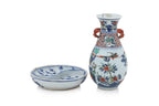 A MINIATURE WUCAI VASE AND A BLUE AND WHITE LOTUS DISH