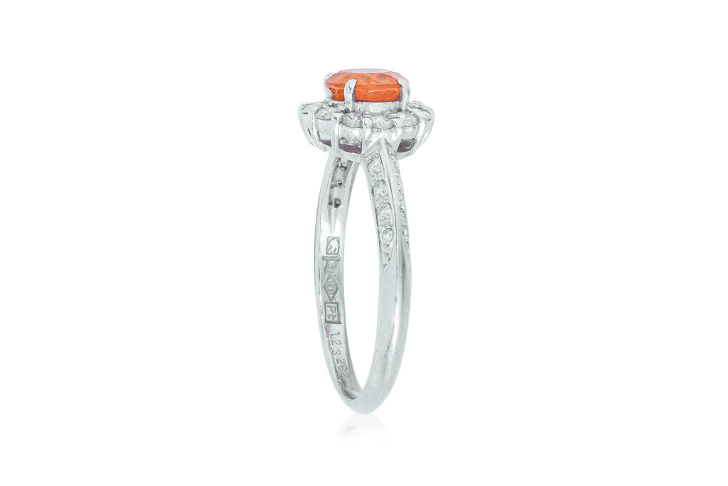 A SPESSARTITE GARNET AND DIAMOND RING BY SEIKO