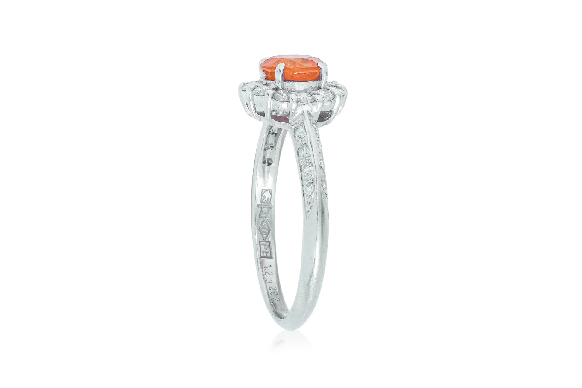 A SPESSARTITE GARNET AND DIAMOND RING BY SEIKO