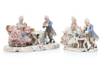A GROUP OF FIVE GERMAN PORCELAIN FIGURES AND A CLOCK