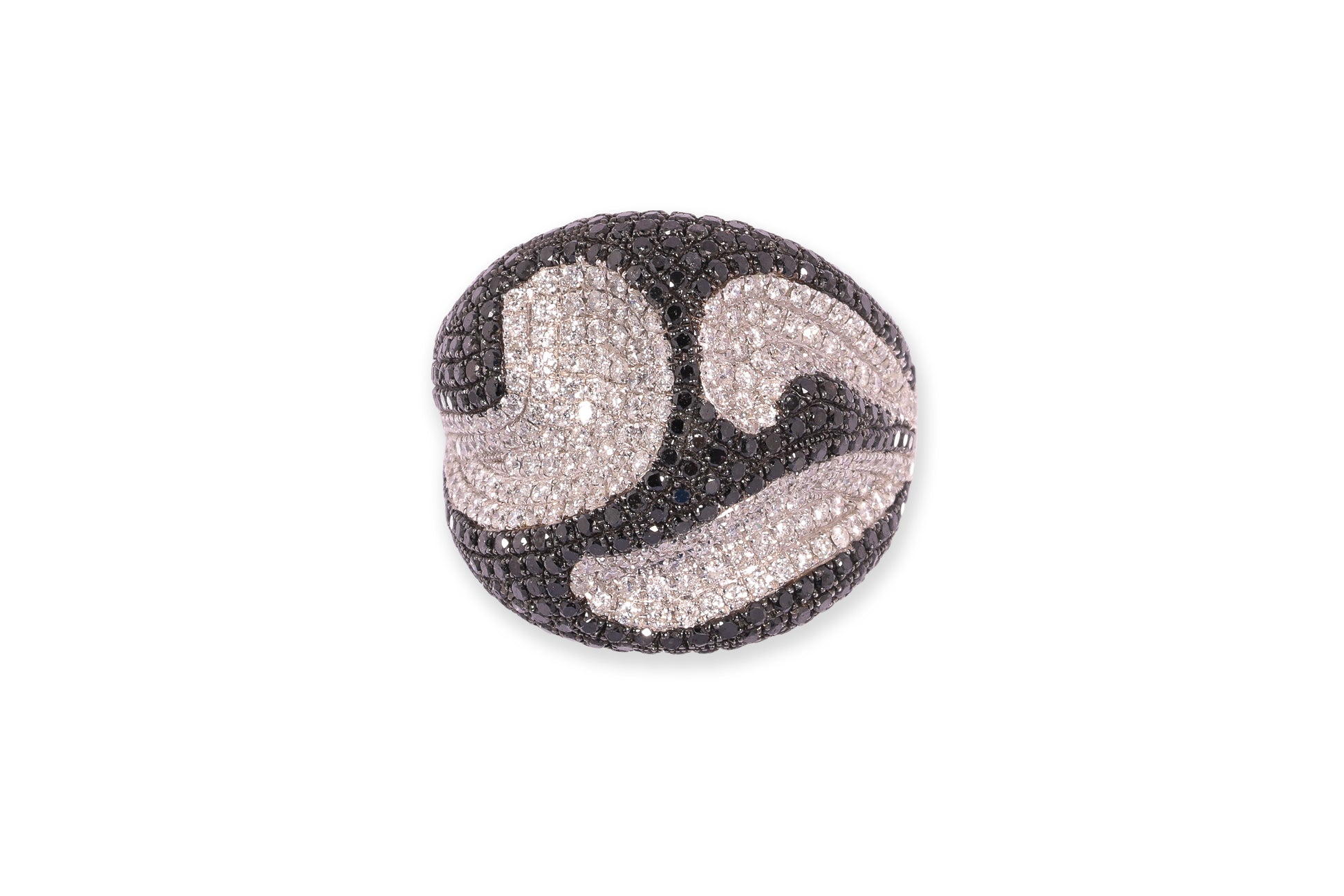 A DIAMOND AND BLACK DIAMOND STYLISED 'SKULL' RING