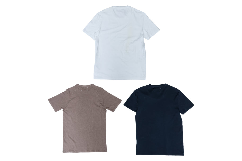 MAISON MARTIN MARGIELA - A GROUP OF THREE T-SHIRTS