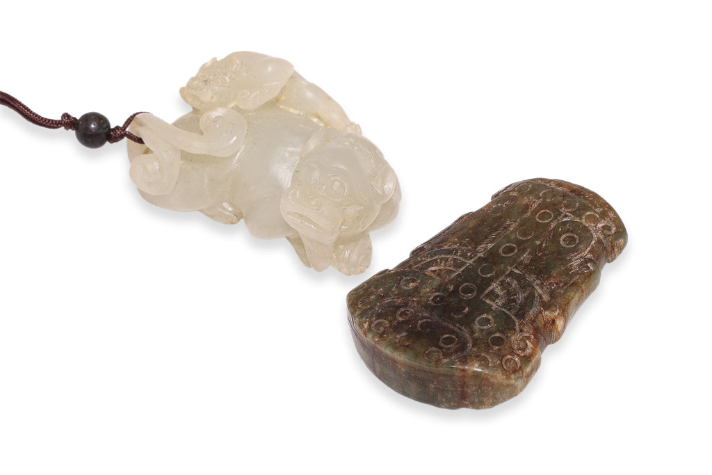 A GROUP OF THREE STONE CARVINGS