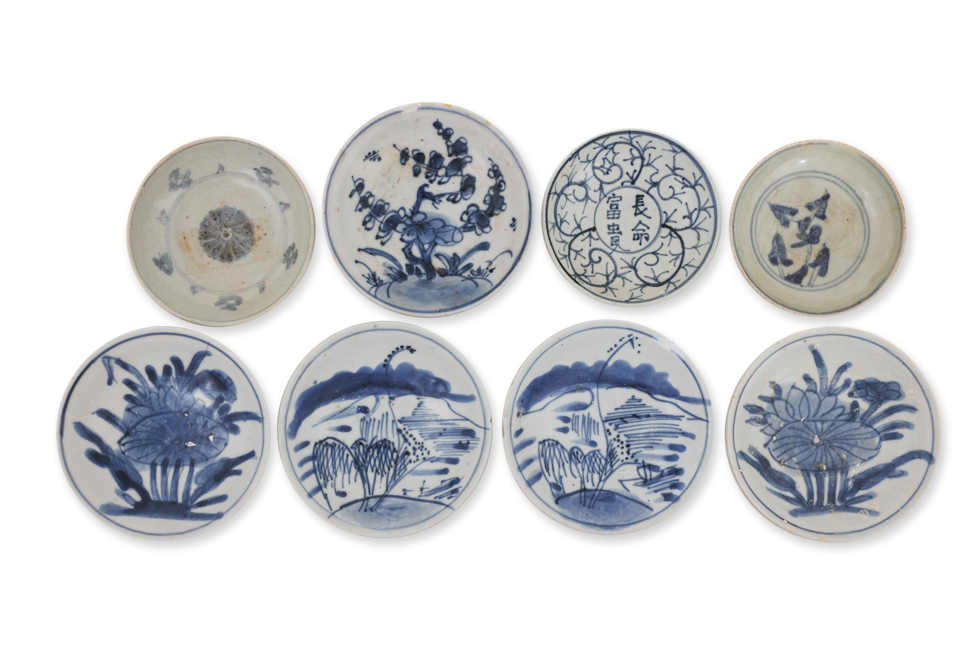 A GROUP OF EIGHT SMALL BLUE AND WHITE DISHES
