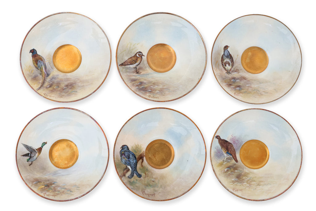 A HARLEQUIN SET OF ELEVEN ROYAL WORCESTER 'GAME BIRDS' PORCELAIN COFFEE CUPS AND SAUCERS (11)