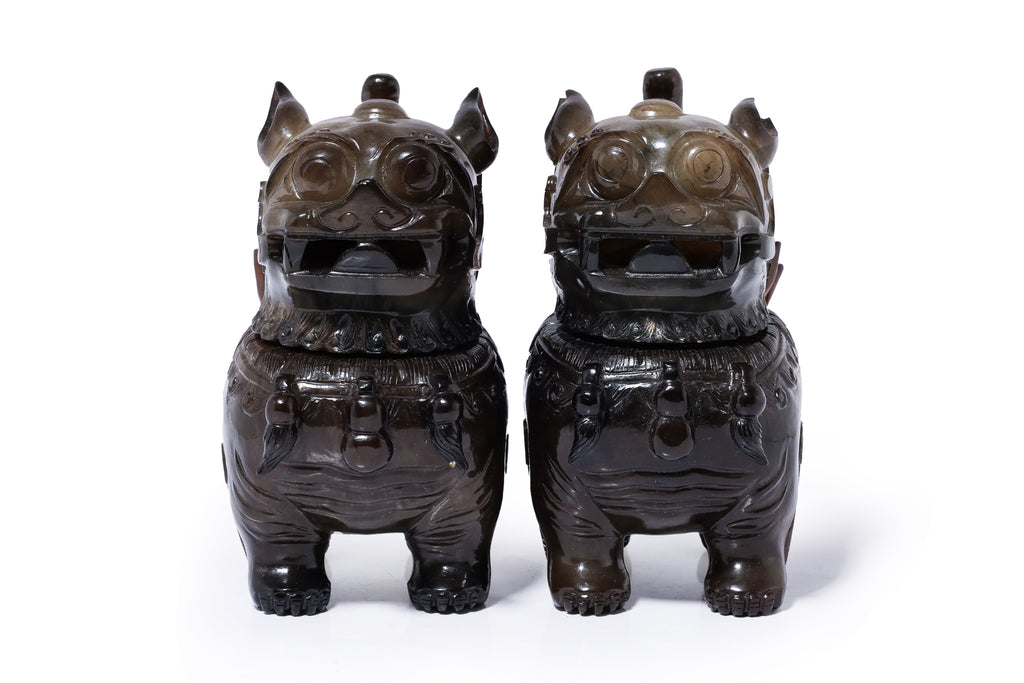 A PAIR OF JADE FOO LION-FORM VESSELS