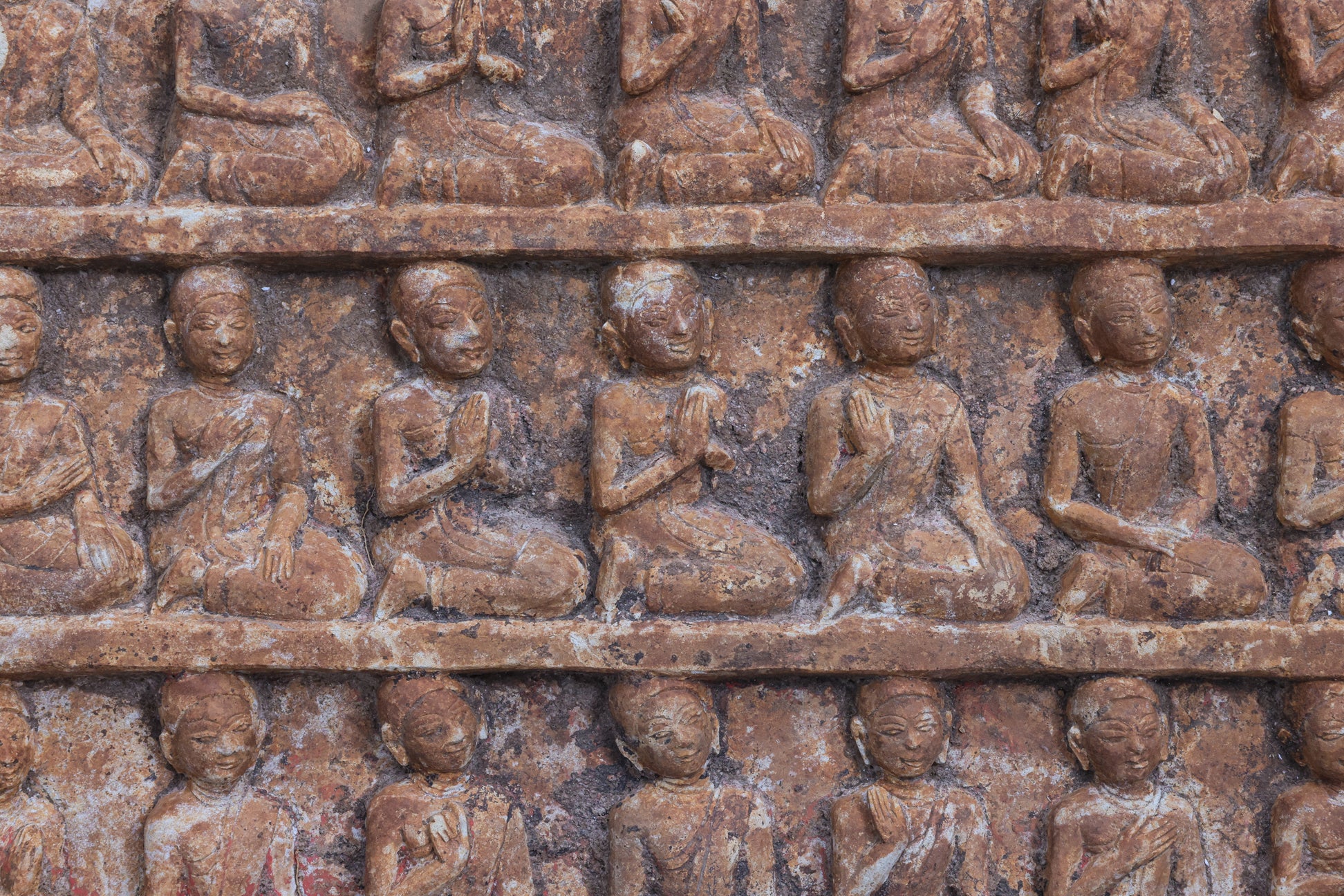 A PAIR OF SOUTHEAST ASIAN CARVED STONE PANELS