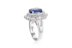 A TANZANITE AND DIAMOND CLUSTER RING