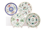 A GROUP OF FOUR FAMILLE ROSE SAUCERS