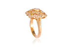 A HIGH KARAT GOLD DIAMOND 'FLOWER' RING