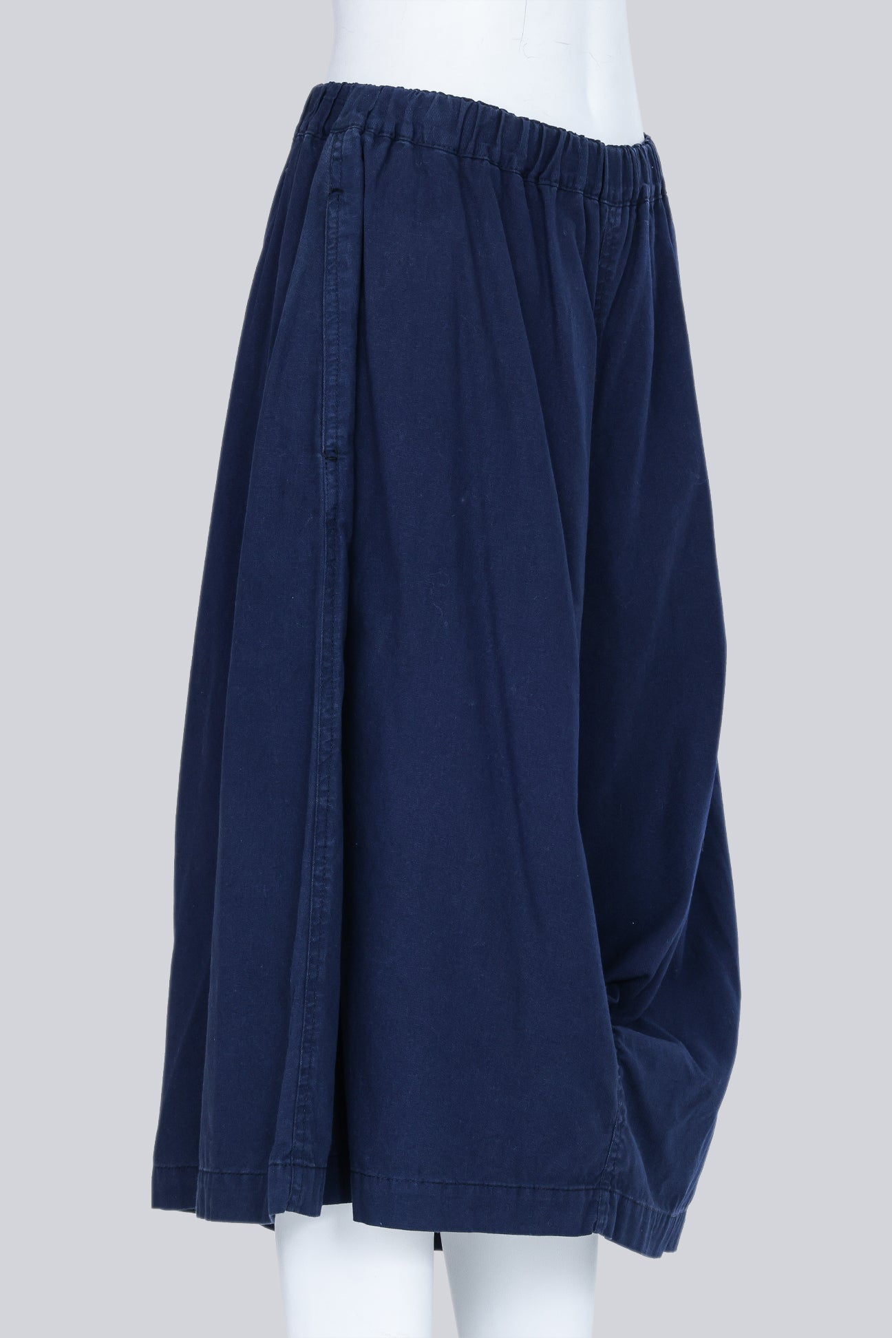 COMME DES GARCONS BLACK - A PAIR OF 2011 NAVY HOLE CULOTTES