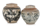 TWO BLUE AND WHITE JARS AND COVERS