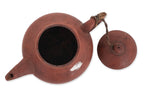 A YIXING POTTERY TEAPOT AND COVER