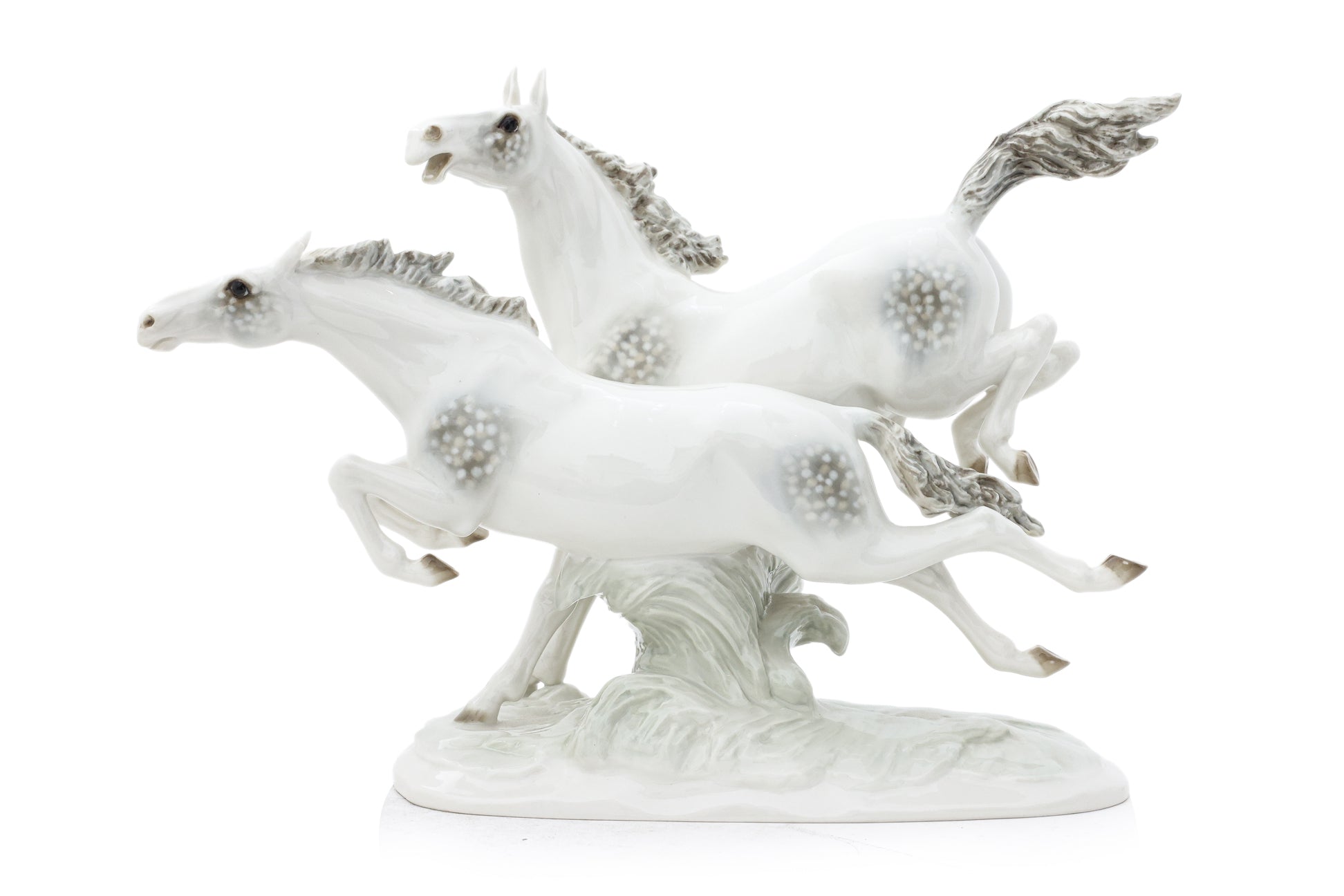 A HUTSCHENREUTHER 'IN FREEDOM' HORSES PORCELAIN GROUP