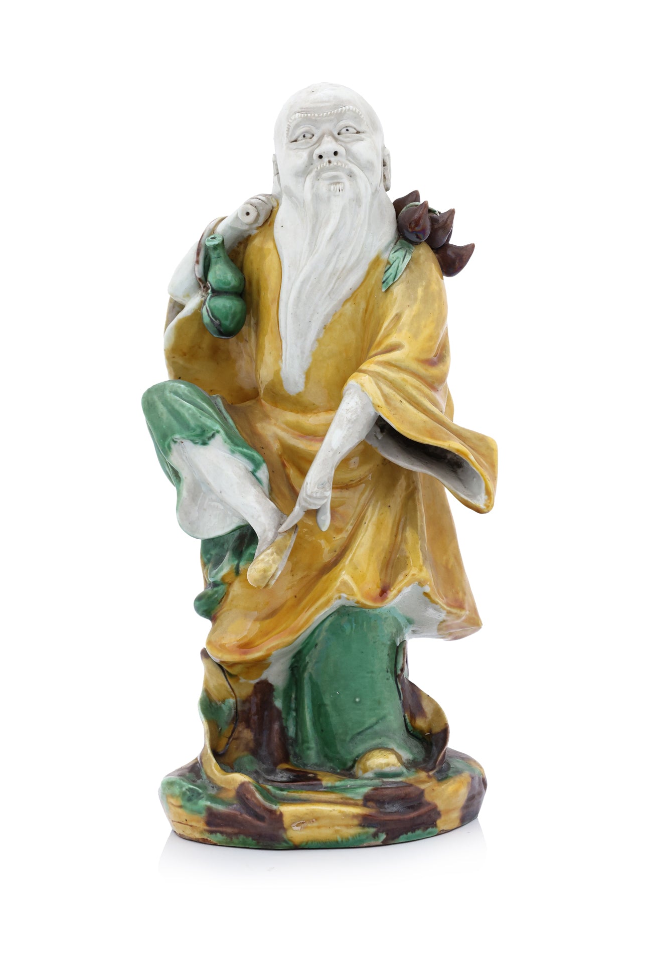 A SANCAI-GLAZED PORCELAIN FIGURE OF DONGFANG SHUO
