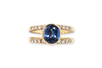 A SAPPHIRE AND DIAMOND RING