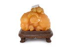 A YELLOW TIANHUANG-TYPE STONE MODEL OF AN ELEPHANT AND MONKEY