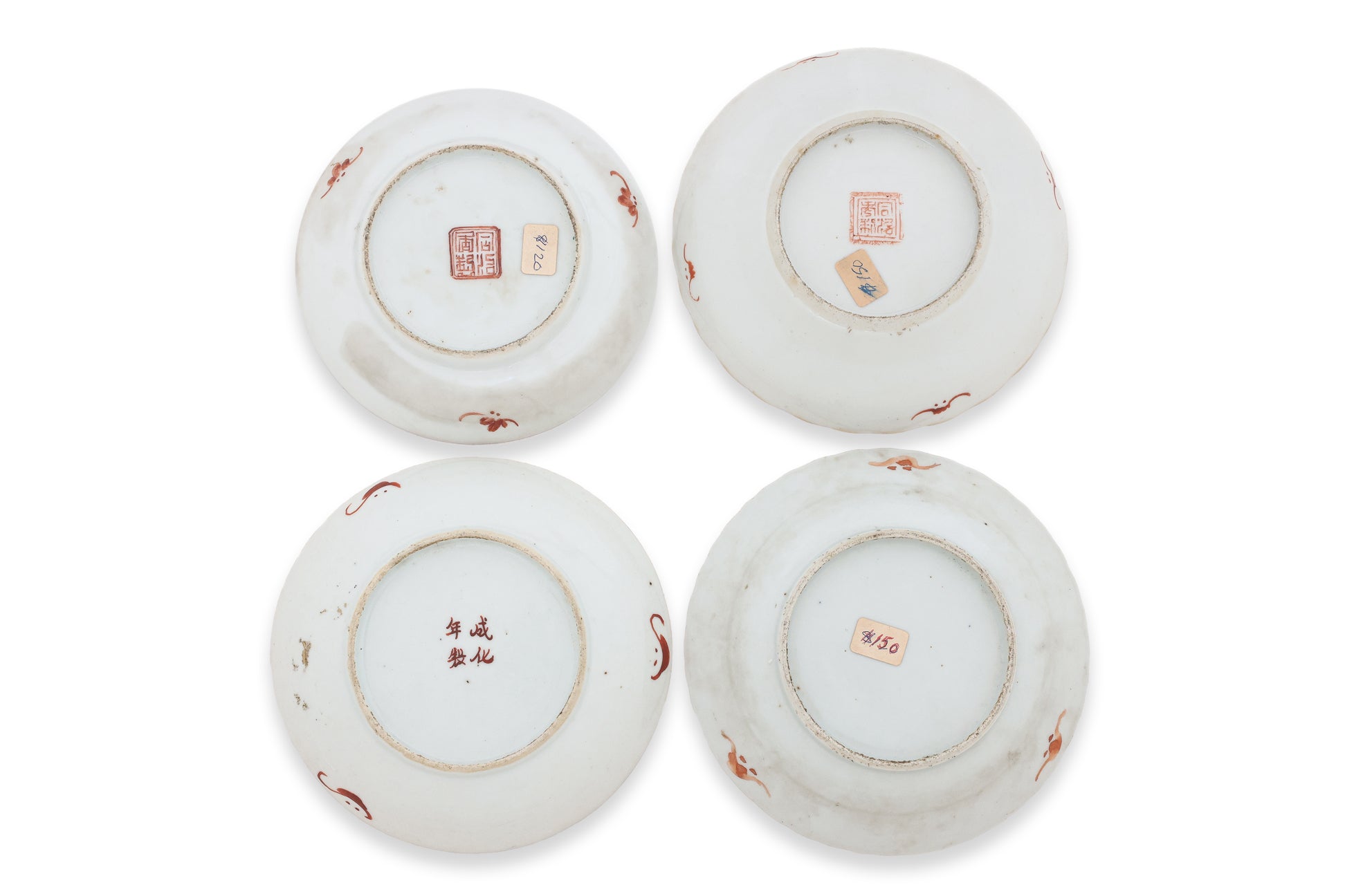 A GROUP OF FOUR FAMILLE ROSE SAUCERS