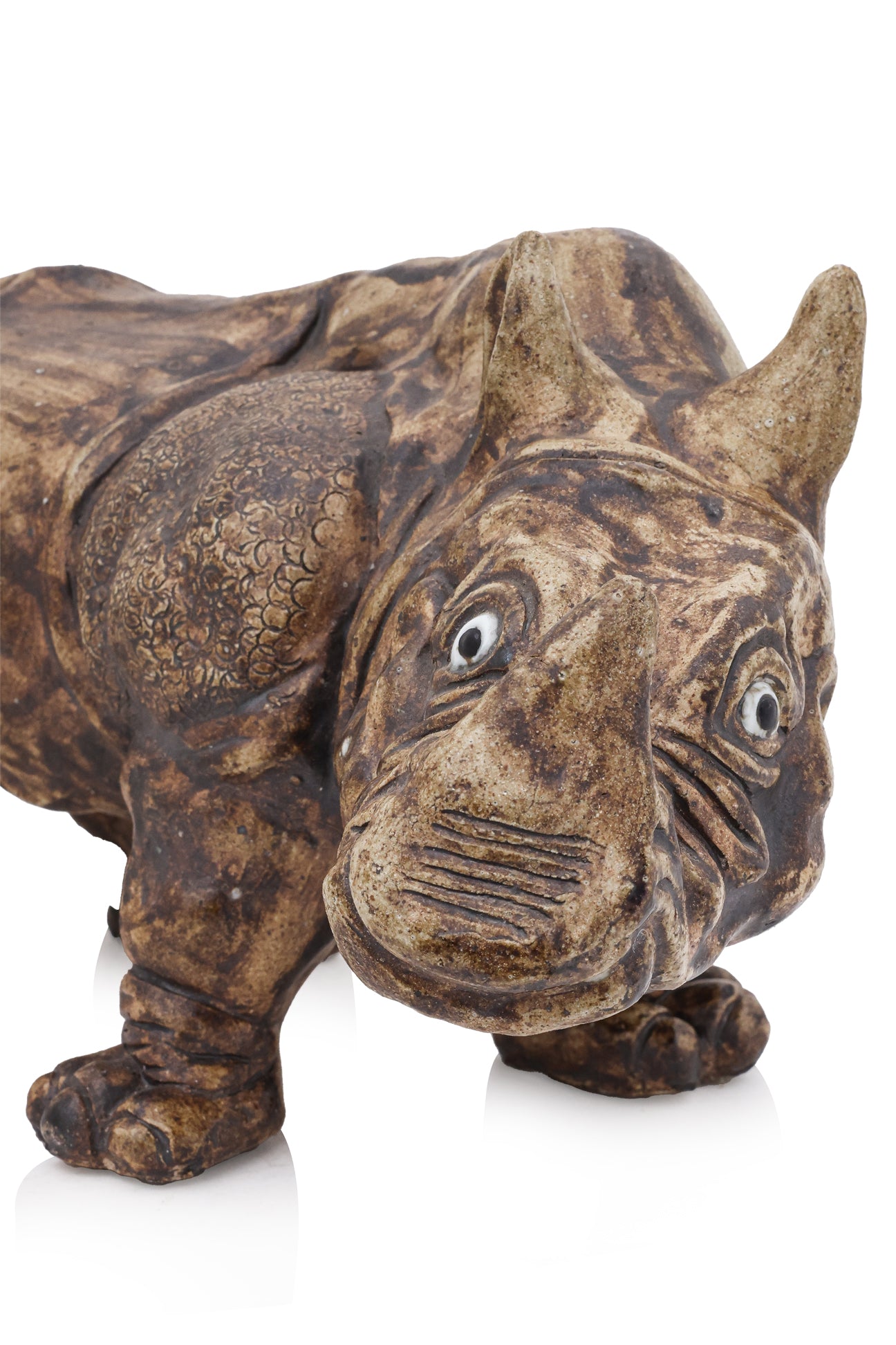 A LARGE SHIWAN POTTERY MODEL OF A RHINOCEROS