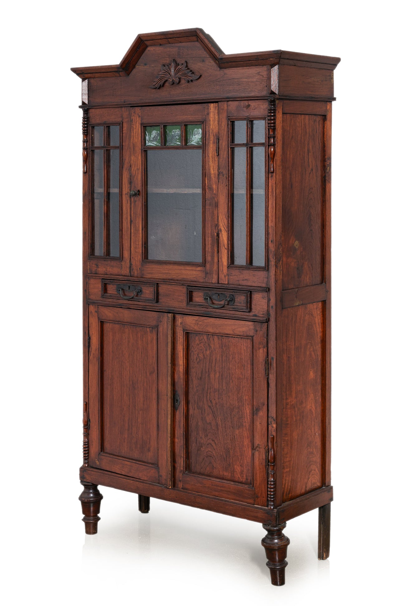 A SMALL GLAZED TEAK CABINET