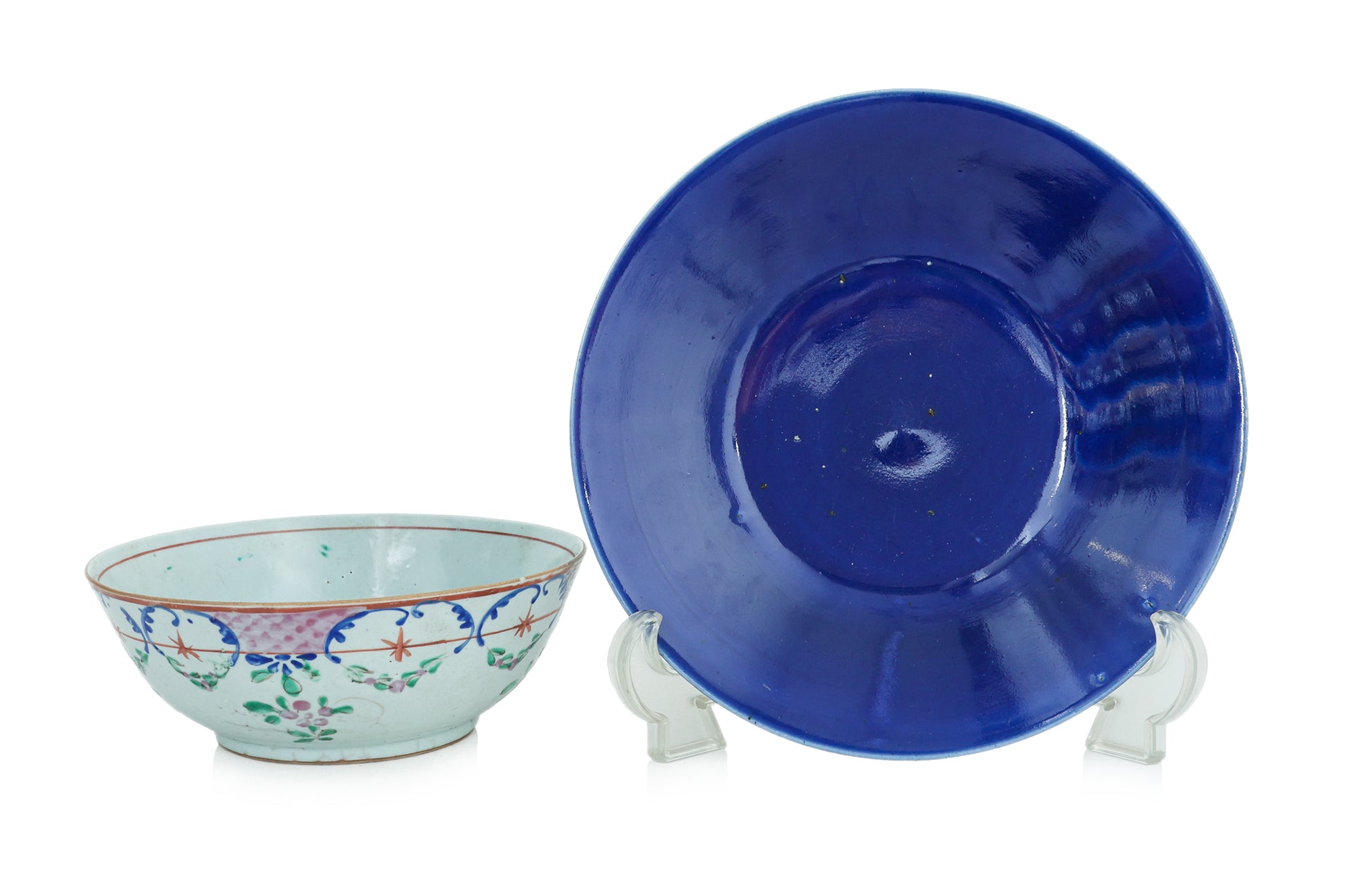 A FAMILLE ROSE CANTON BOWL AND A MONOCHROME BLUE DISH