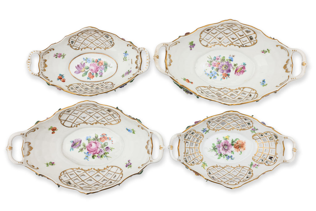 A GROUP OF FOUR DRESDEN PORCELAIN BASKETS