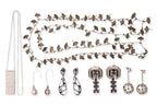 AN ASSORTMENT OF MOSTLY SILVER COSTUME JEWELLERY