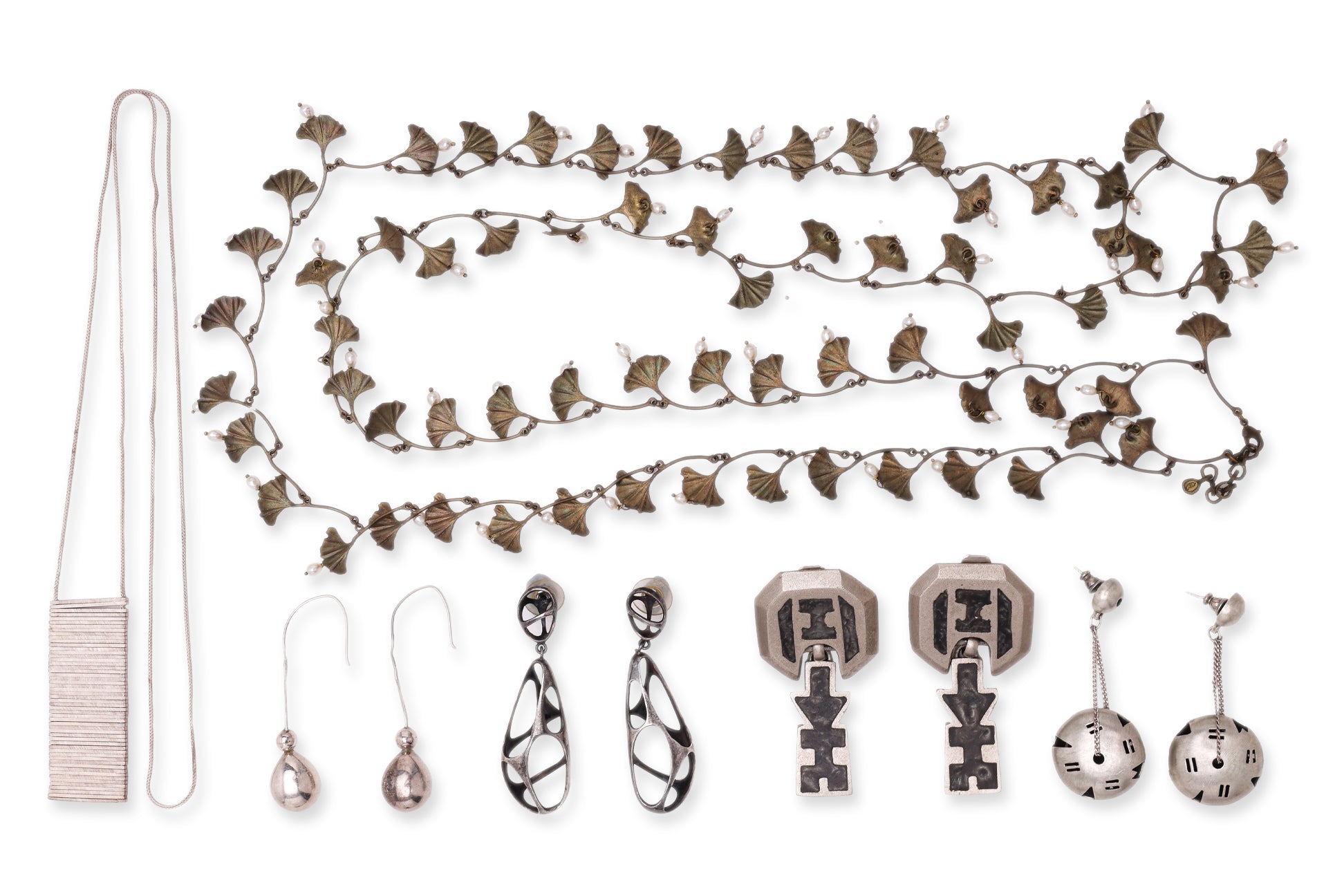 AN ASSORTMENT OF MOSTLY SILVER COSTUME JEWELLERY