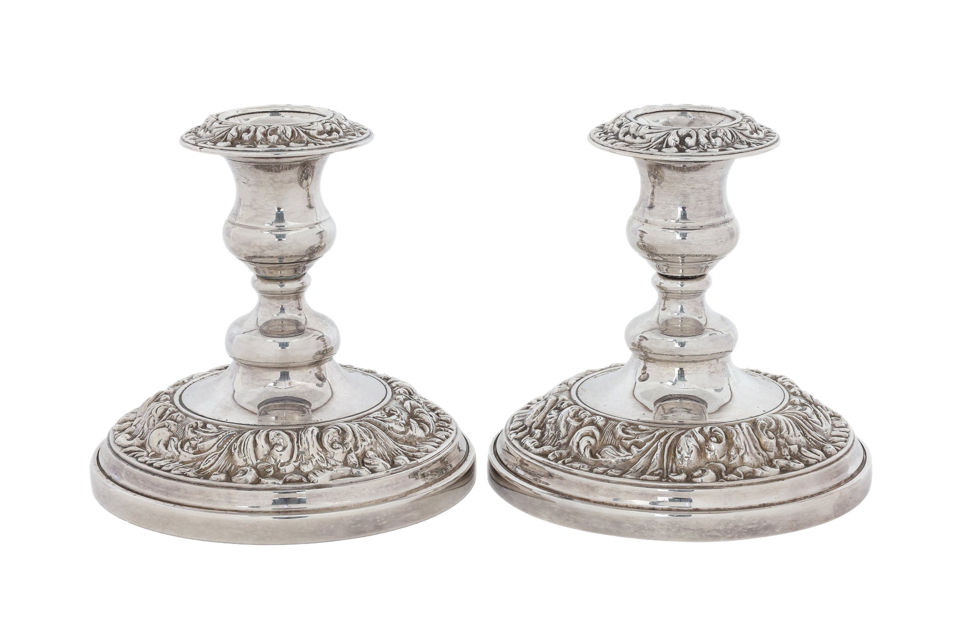 A PAIR OF ENGLISH SILVER PLATED CANDLESTICKS