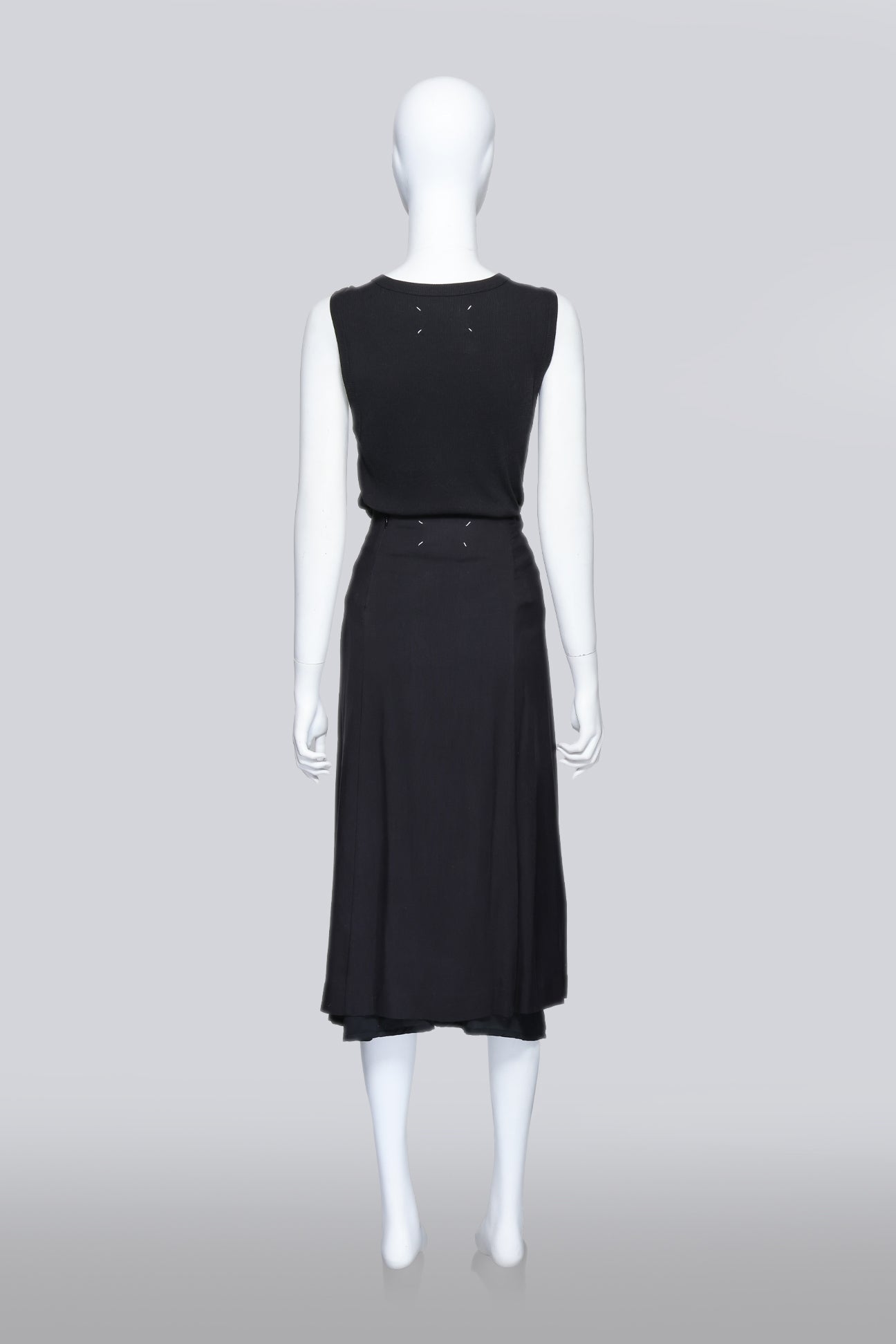 MARTIN MARGIELA - A BLACK BUCKLE TANK AND SKIRT SET