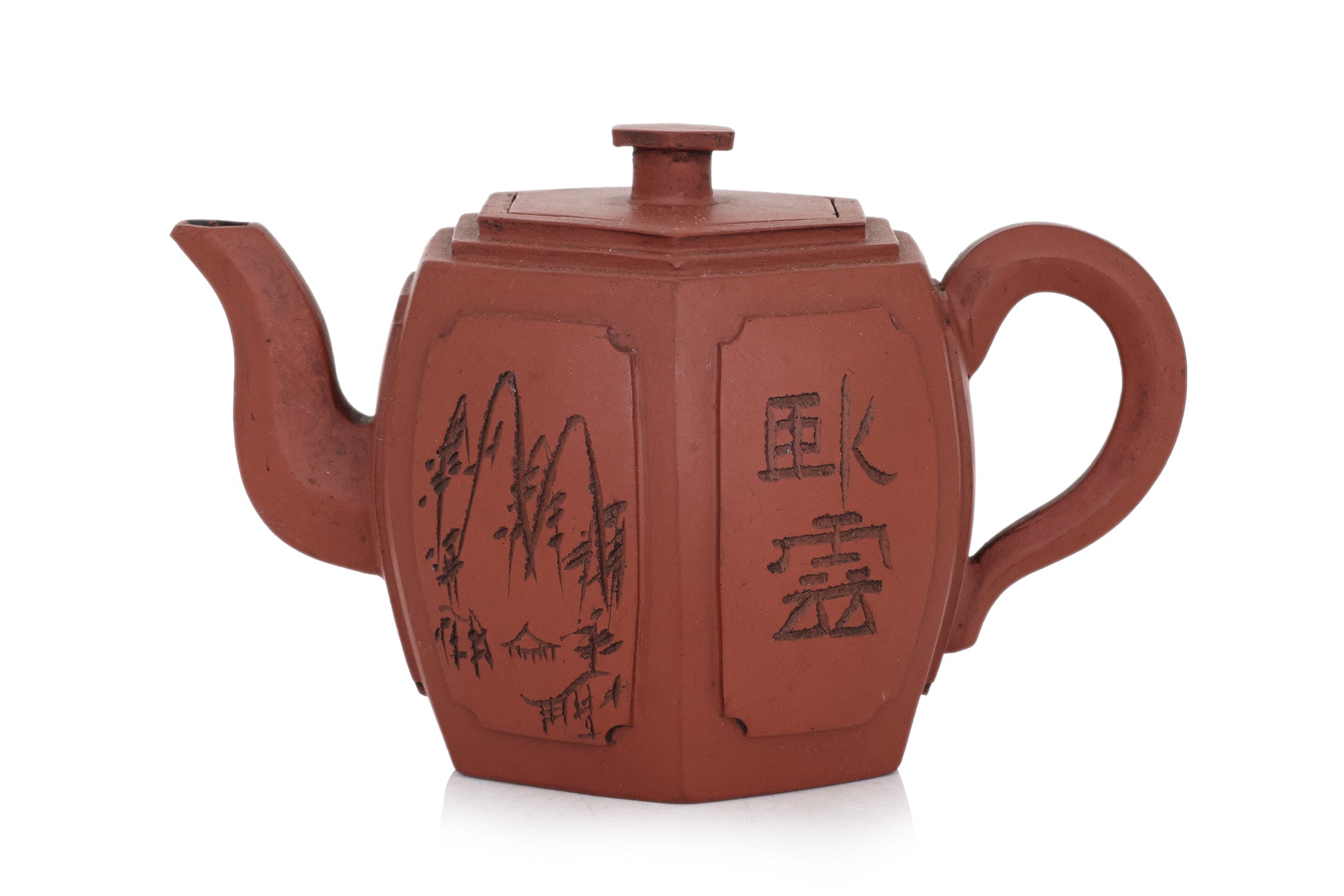 A YIXING POTTERY TEAPOT AND COVER