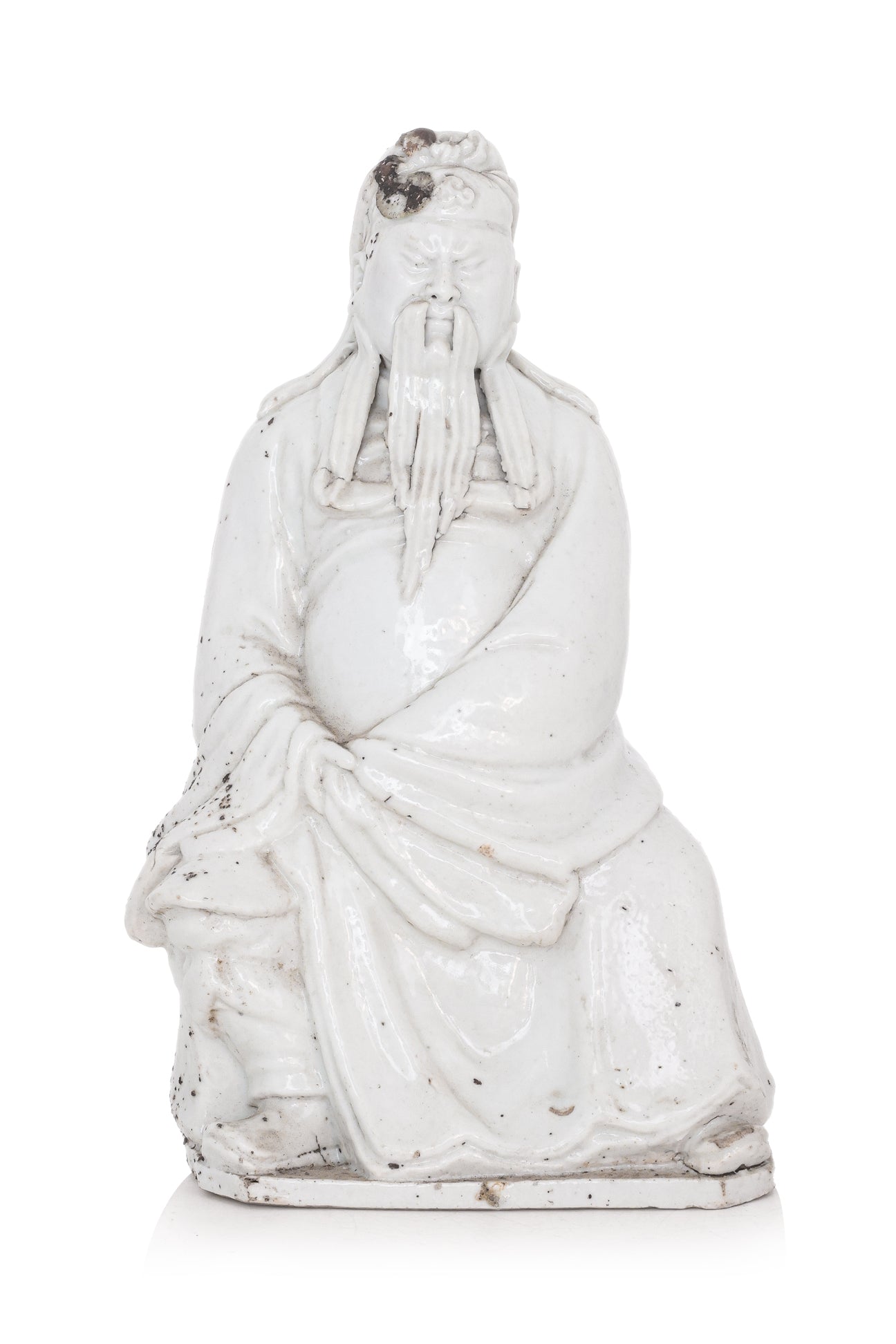 A BLANC DE CHINE PORCELAIN MODEL OF GUANDI