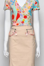 JOHN GALLIANO - A FLORAL SHIRT AND BEIGE SKIRT ENSEMBLE
