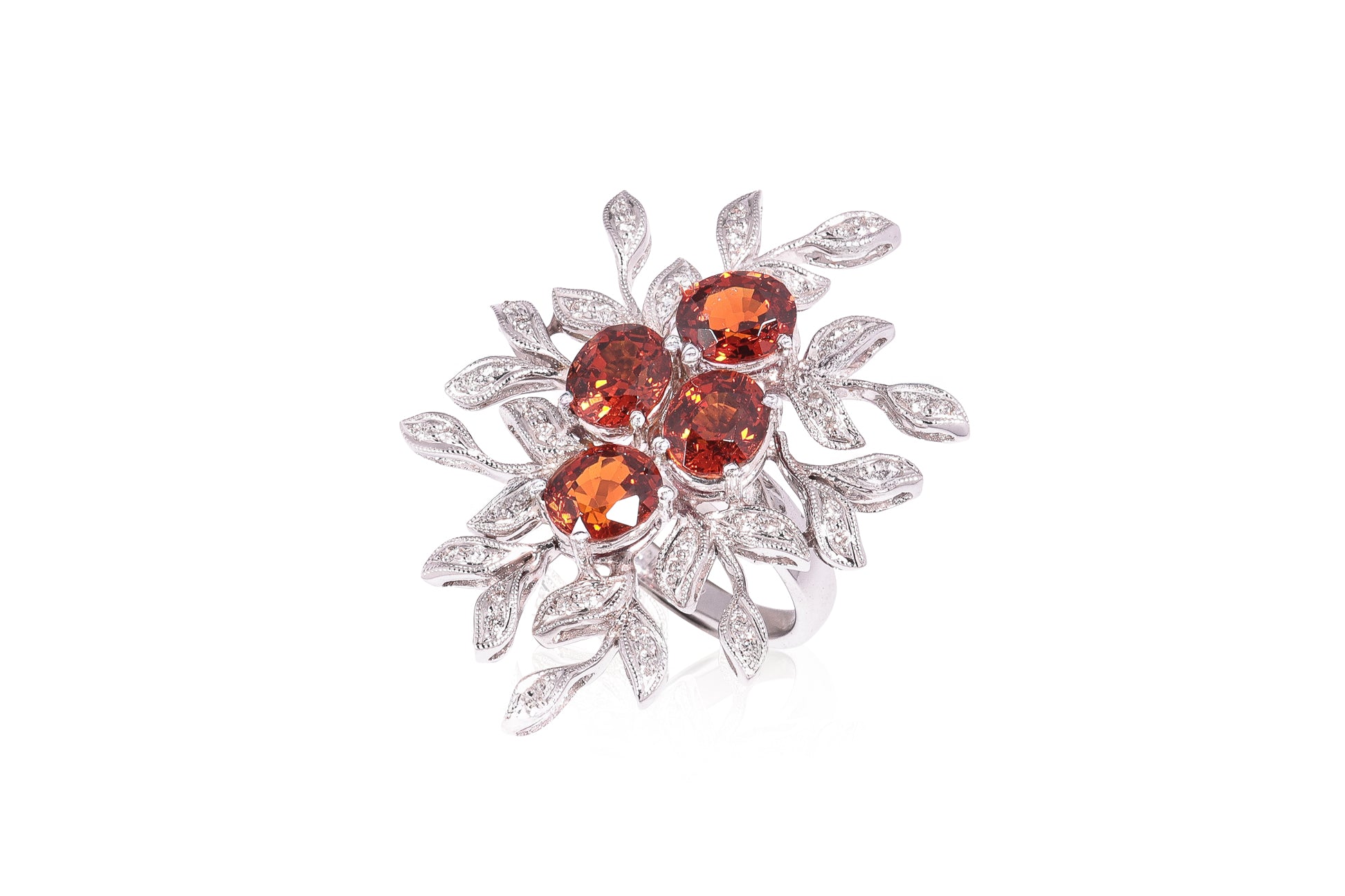 A GARNET AND DIAMOND 'BOUQUET' RING