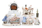 A GROUP OF FIVE GERMAN PORCELAIN FIGURES AND A CLOCK