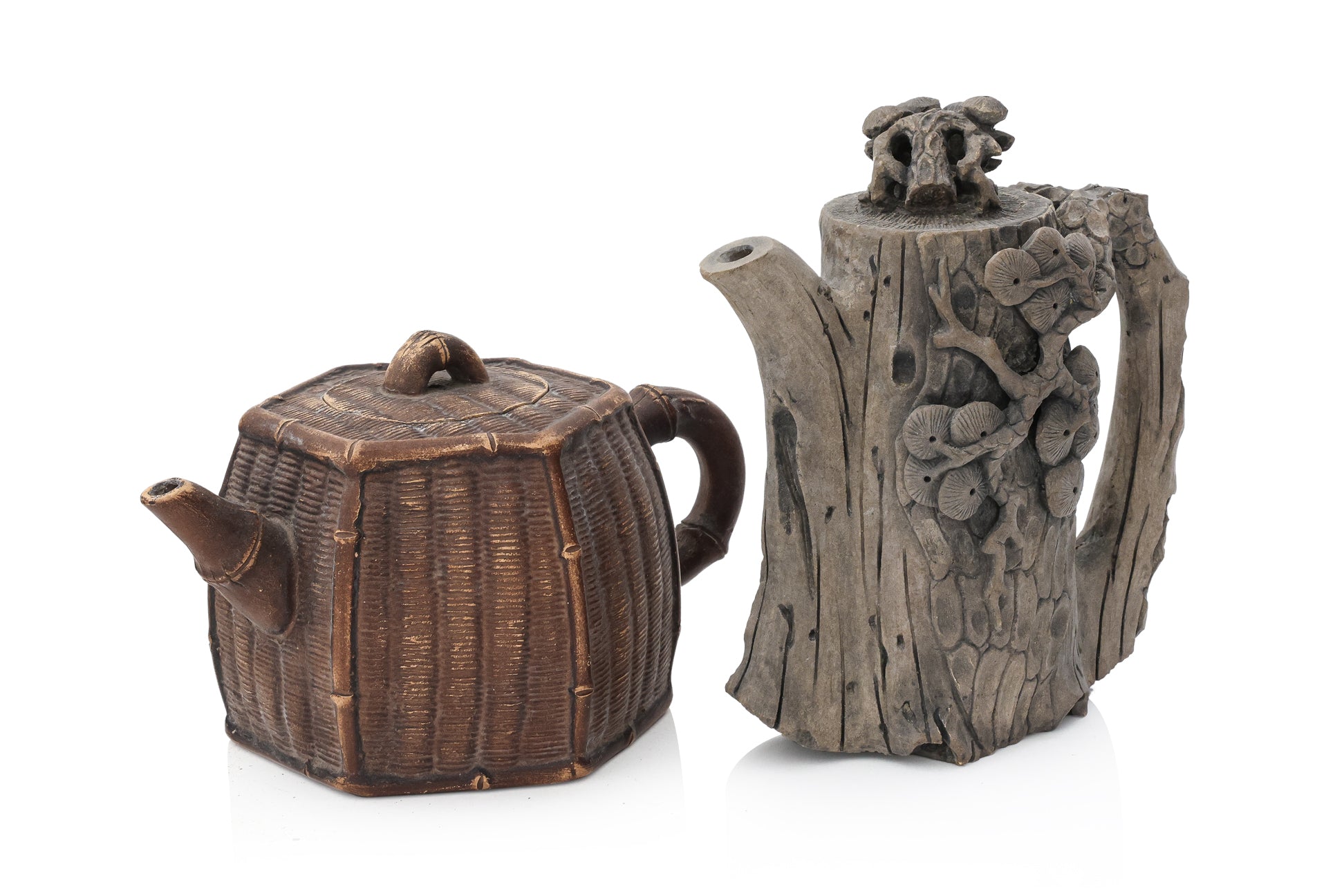 A GROUP OF FIVE YIXING ZISHA POTTERY TEAPOTS AND A BRUSH WASHER