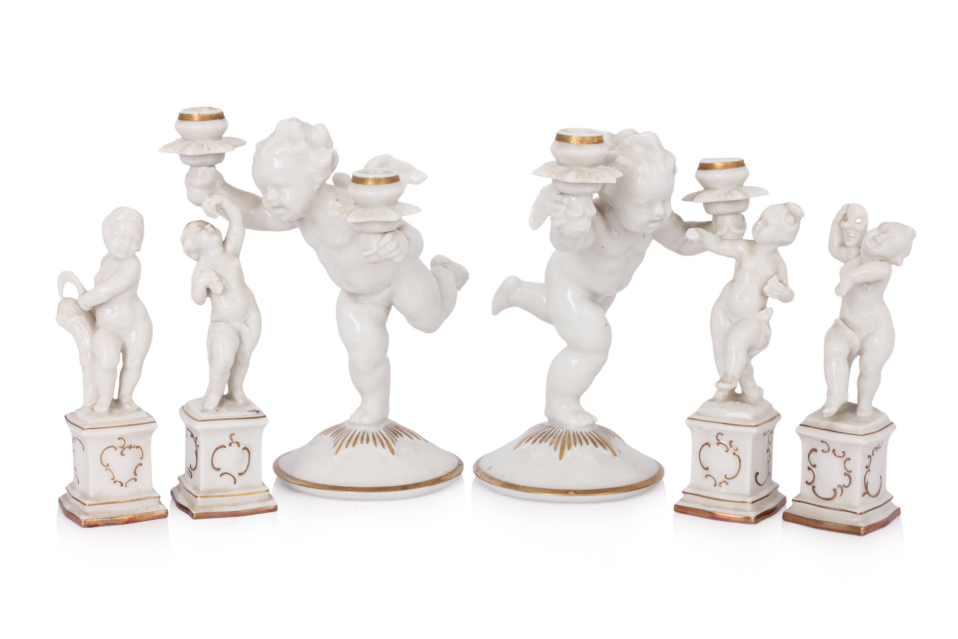 A GROUP OF SIX HUTSCHENREUTHER PORCELAIN FIGURES OF CHERUBS