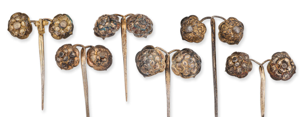 A GROUP OF EIGHT SILVER HAIR PINS