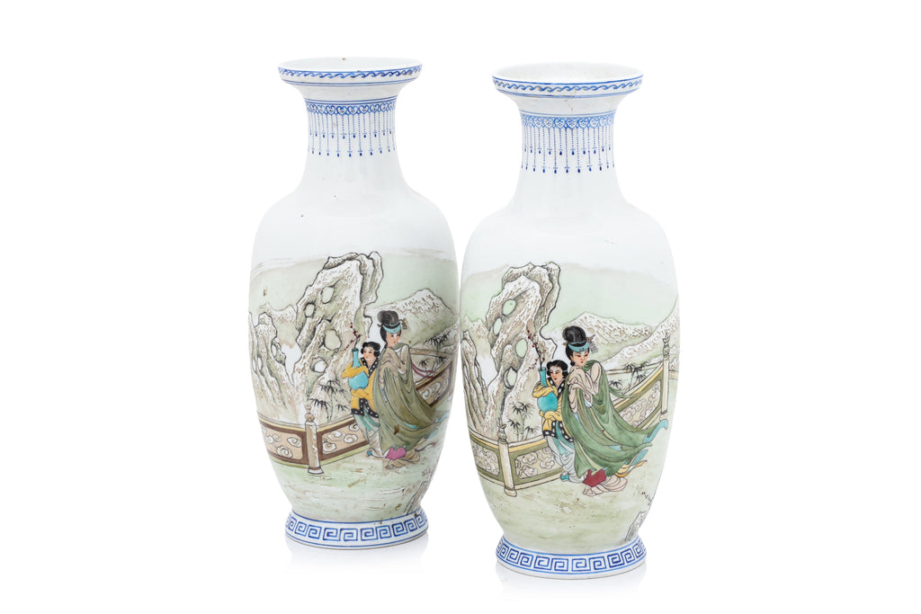 A PAIR OF WINTER SCENE DECORATED PORCELAIN VASES