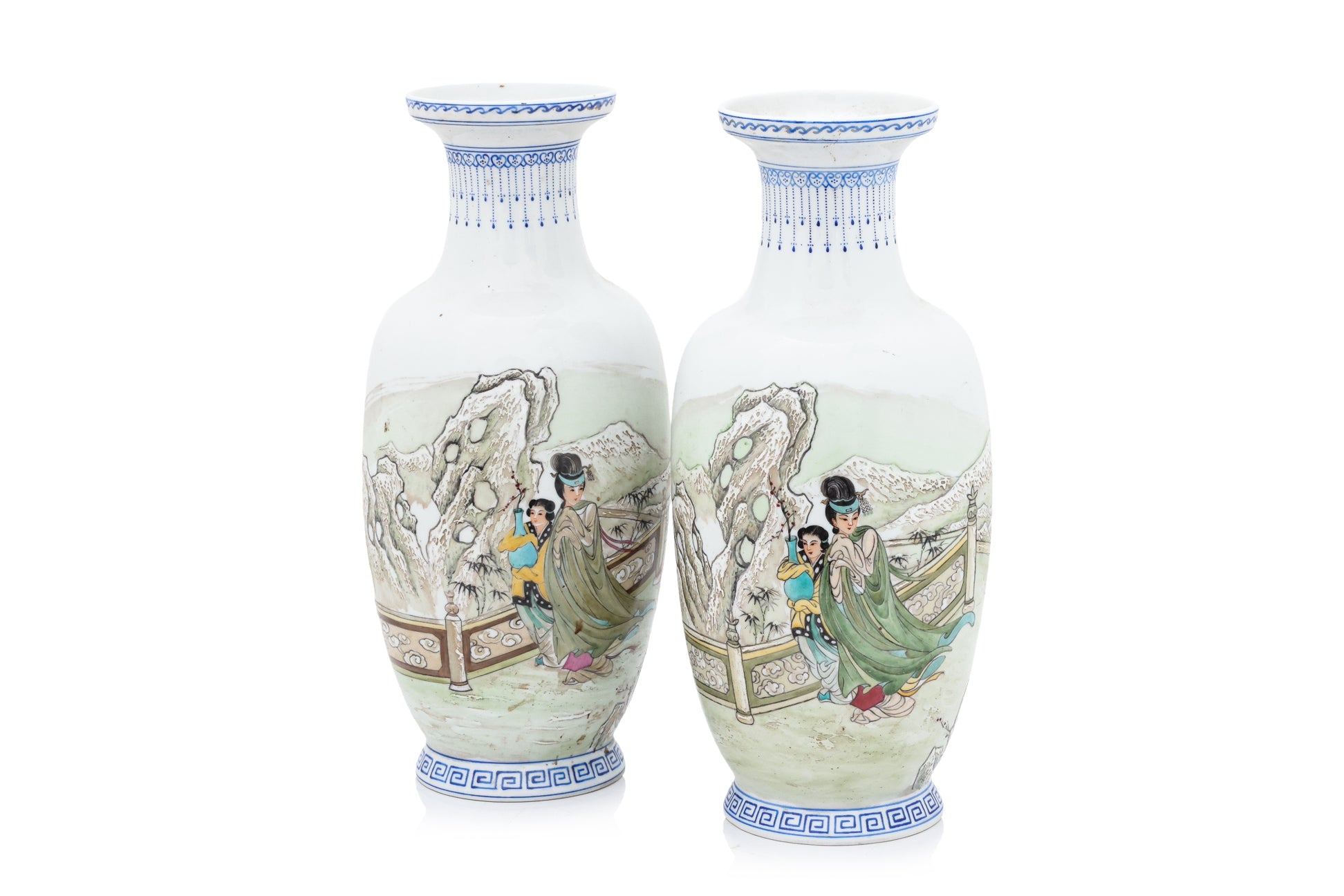 A PAIR OF WINTER SCENE DECORATED PORCELAIN VASES