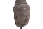 A CAMBODIAN KHMER CARVED STONE HEAD OF A DEITY