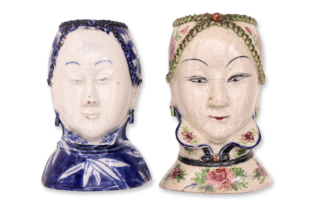 A GROUP OF FOUR FIGURAL PORCELAIN WALL POCKETS