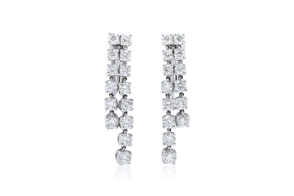 A PAIR OF DIAMOND SCREW-BACK EARRINGS BY MONNICKENDAM