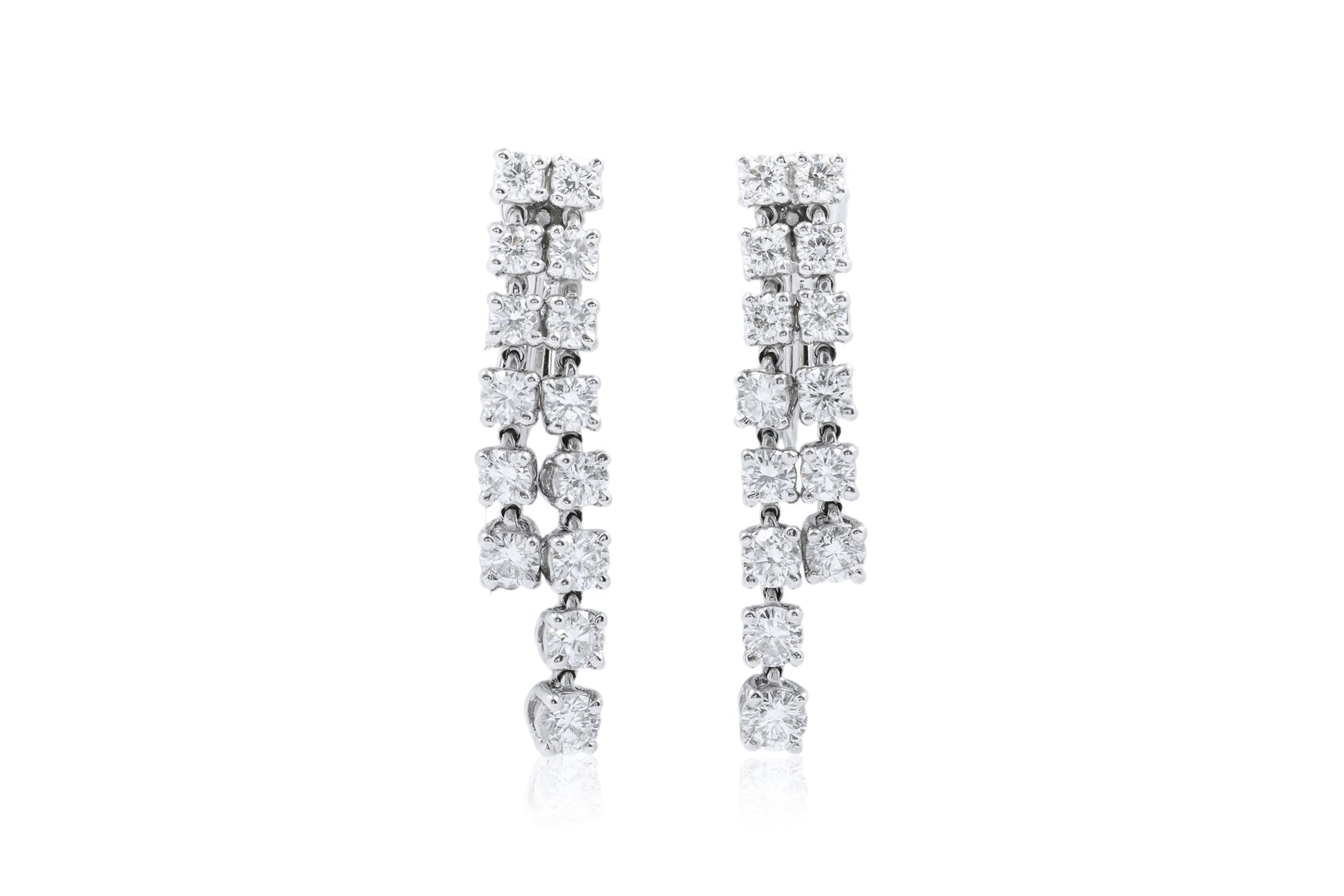 A PAIR OF DIAMOND SCREW-BACK EARRINGS BY MONNICKENDAM